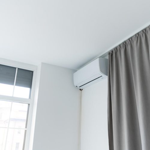 air-conditioner-on-a-white-wall-background